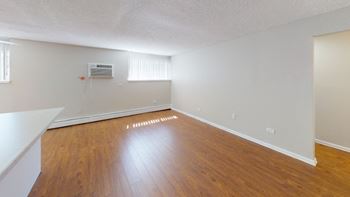 Hardwood-style flooring in kitchens and living areas